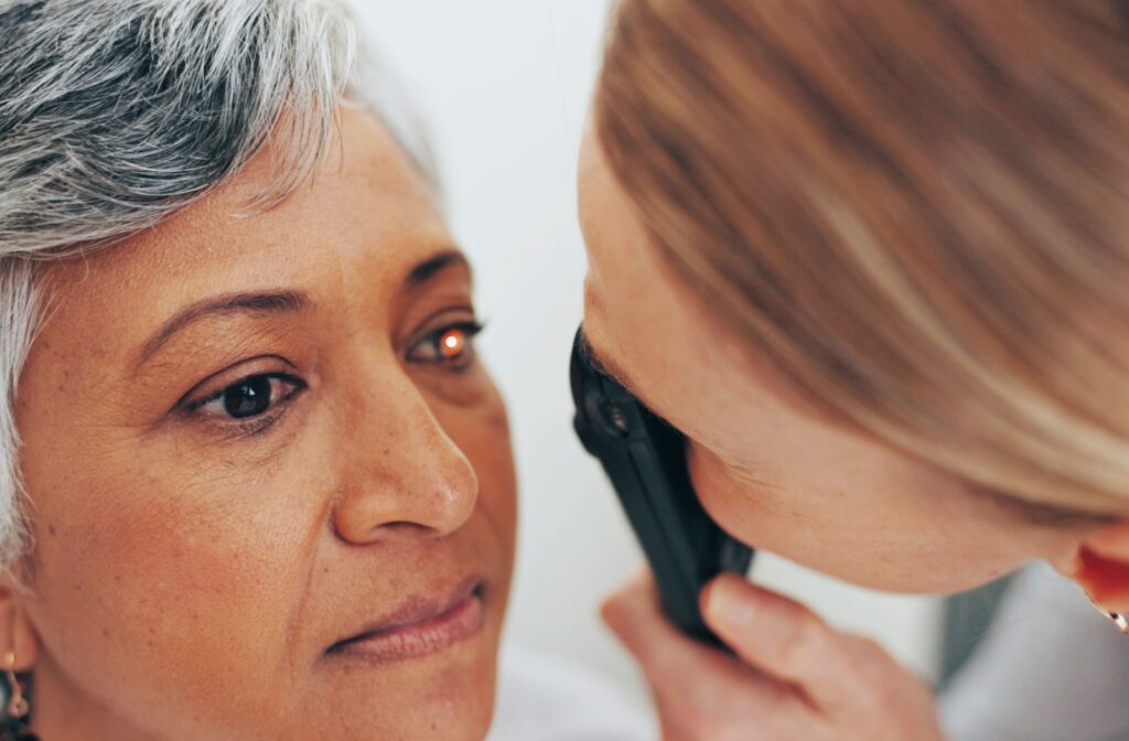 Woman undergoes a retinoscope test to check her eye sight