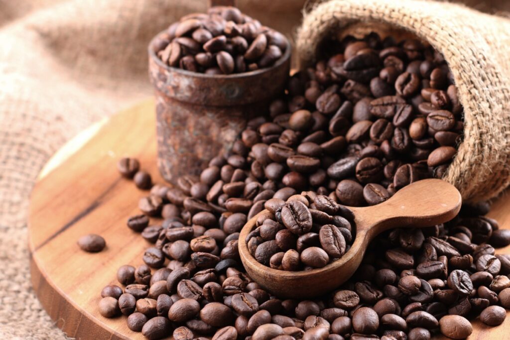 A close up of coffee beans to represent caffeine intake impacting twitching eyes